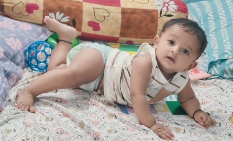 16 month old not talking: toddler sitting quietly while parent tries to communicate, showing early speech delay signs