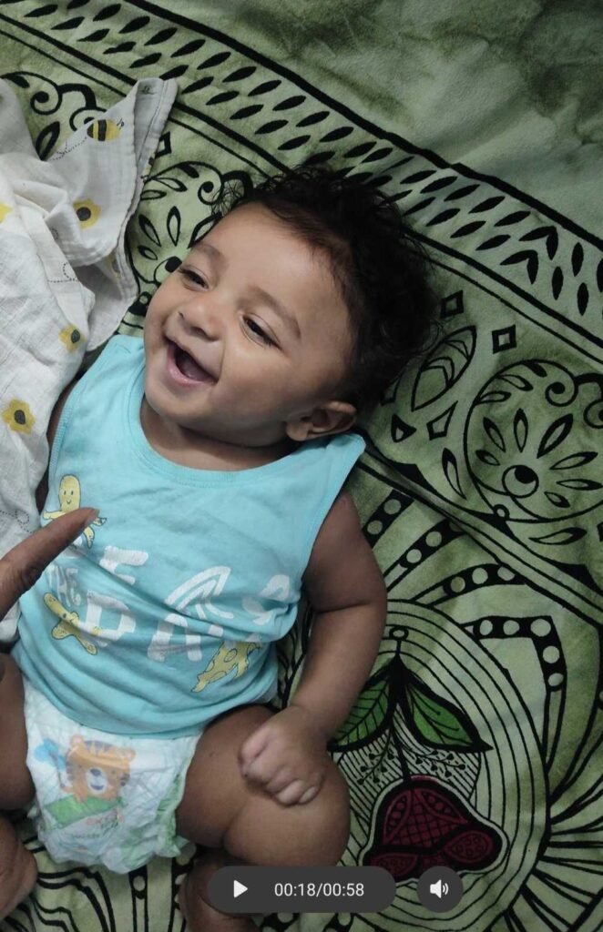 Baby laughing out loud for the first time at 4 months old during tummy time