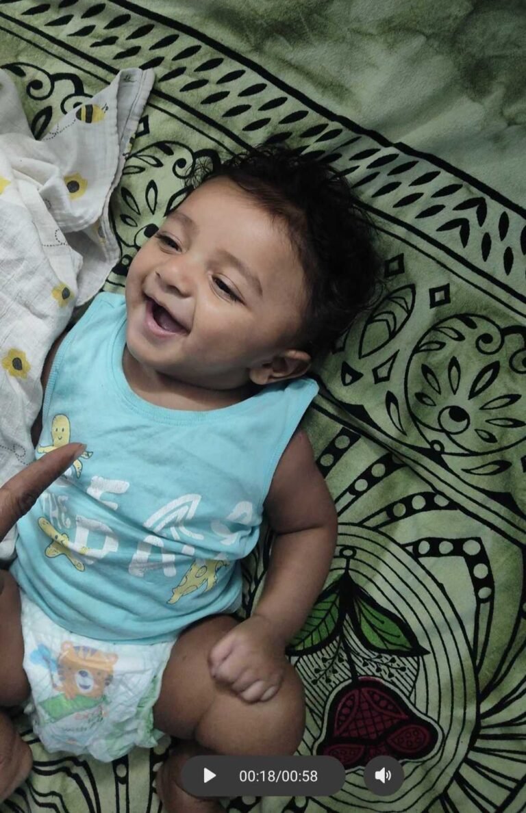 Baby laughing out loud for the first time at 4 months old during tummy time